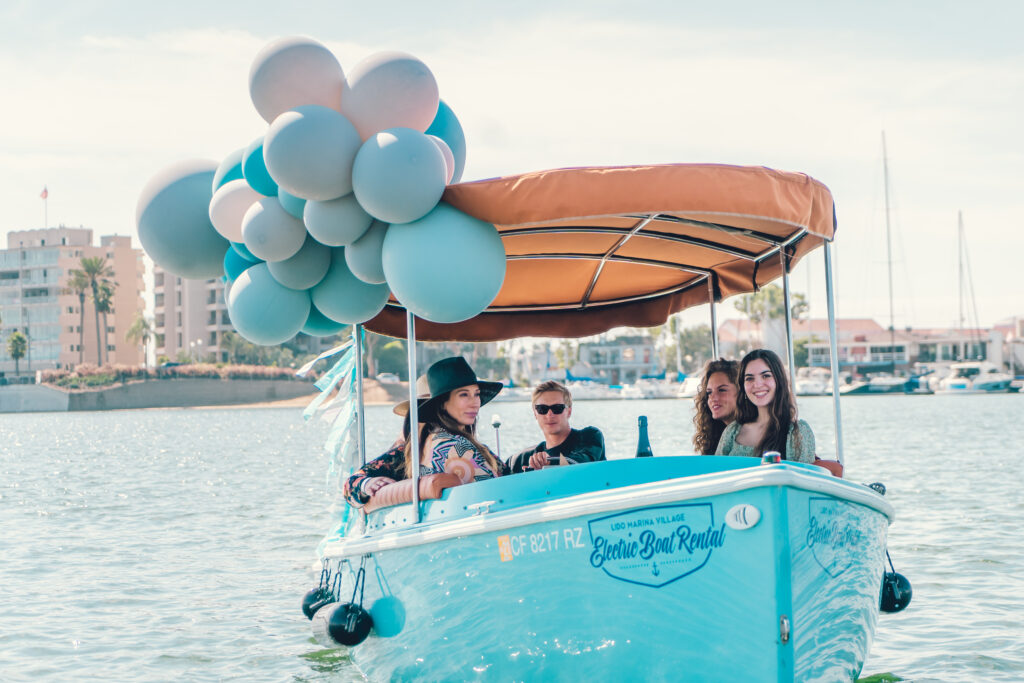 Celebration on an electric boat in Newport Beach